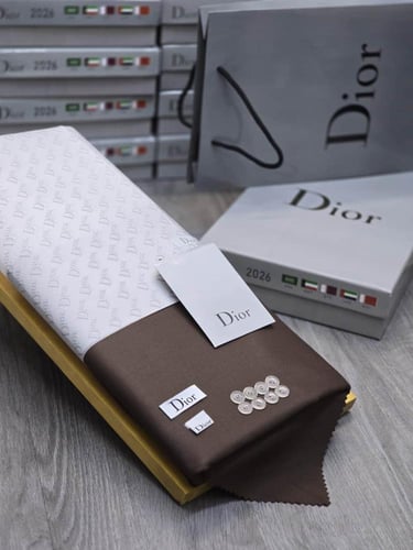 اقمشه شتويه رجاليه الوان دافئة - ساده بنقش خفيف