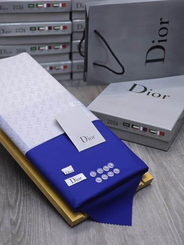 اقمشه شتويه رجاليه الوان دافئة - ساده بنقش خفيف