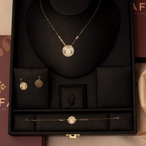 طقم ذهب صافي بتصميم فانكليب الفاخرة