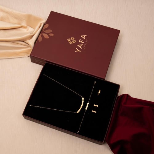 طقم ذهب صافي بتصميم ملفت