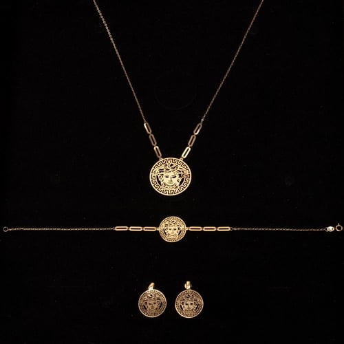 طقم ذهب صافي بتصميم فانكليب الفاخرة