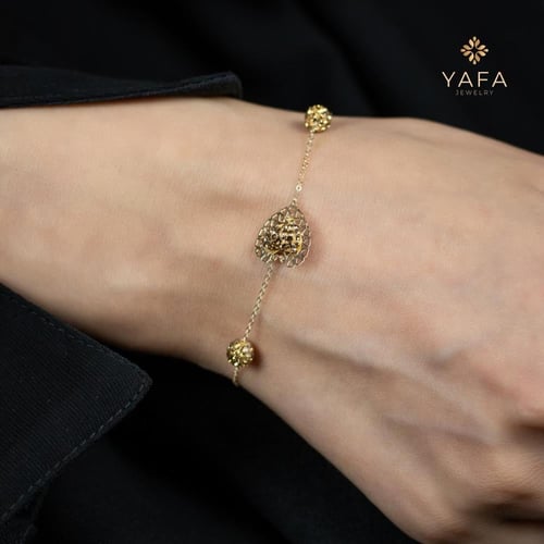 طقم ذهب قلب مزين بالفصوص اللامعة