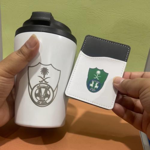 مق الأهلي حافظ للحرارة و البرودة مع محفظة جوال مجا...