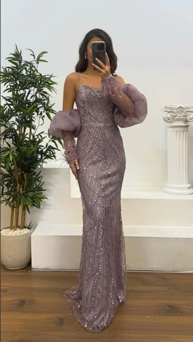 فستان سهره تل مطرز بطانه تفته المزين بالريش