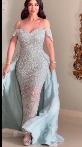 فستان سهره فخم المزين بالتطريز ذيل اورجنزا مزين با...