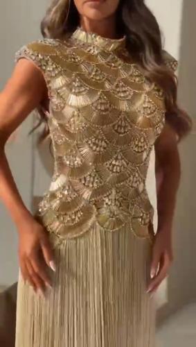 Evening dress decorated with luxurious hand embroidery decorated with fringe
