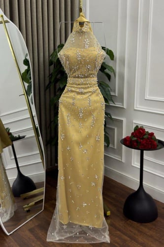 فستان سهره تل المزين بالتطريز اليدوي بشكل انيق