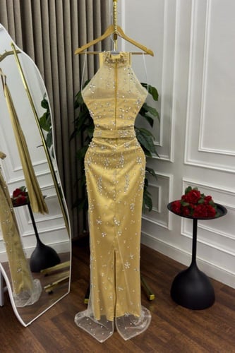 فستان سهره تل المزين بالتطريز اليدوي بشكل انيق