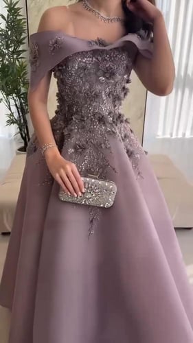 فستان سهره اورجنزا المزين بالكلفه ورود وخرز