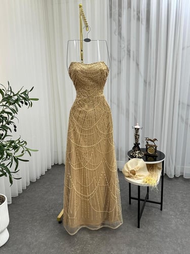 فستان سهره تل مطرز بطانه تفته المزين بالريش