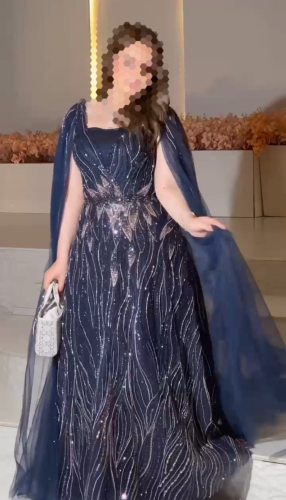 Evening dress Taal Al-Muzeen with computer embroidery and zircon stones