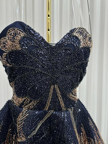 فستان سهره ميكادو دبل كلوش المزين بالكلفه المطرزه...