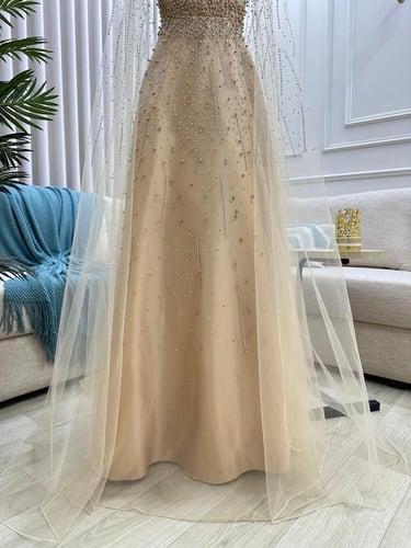 فستان سهره تل المزين بالتطريز اليدوي لول وفصوص بطا...