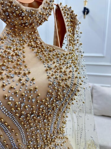 فستان سهره تل المزين بالتطريز اليدوي لول وفصوص بطا...