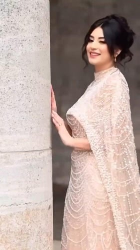 فستان سهره تل المزين بالخرز واللول بشمل كثيف