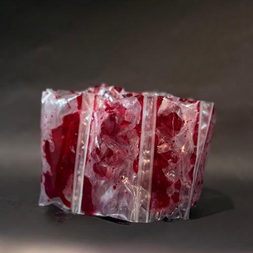 ‏جلي حامض حلو أحمر شريط