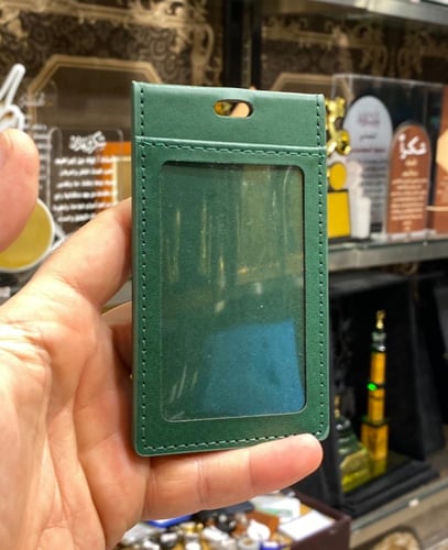 حامل بطاقة جلد لون زيتي خاص بموظفين المديرية العام...