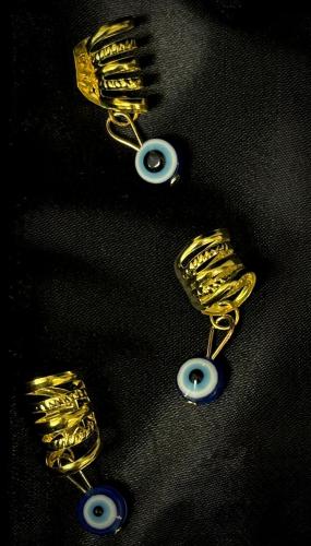 حلقات للشعر مصممه بخرز العين سعر الحبه