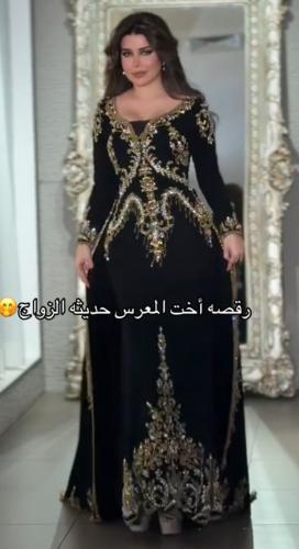 فستان سهرة ملكي أسود ذهبي