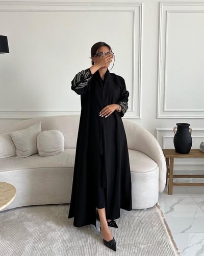 كتان اسود شك بالاكمام