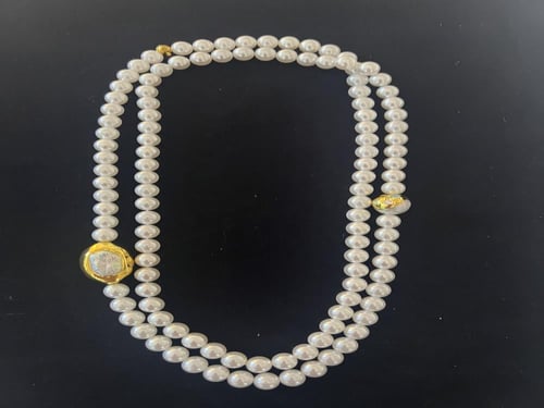 عقد طويل من لؤلؤ الشل البيرل