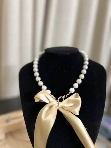 عقد الؤلؤ بالشريطه