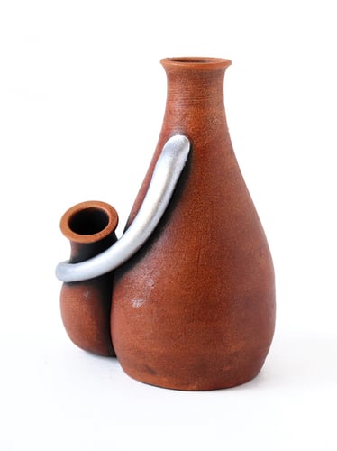 عمل فخاري تعبيري [دفء]