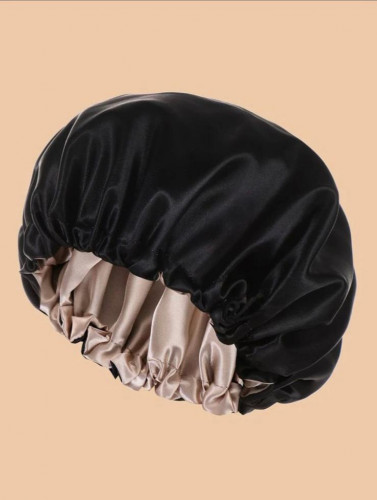 A uniform-colored hair cap (black)