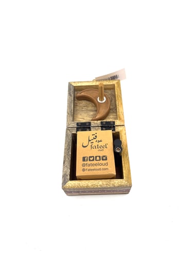 توزيعات عود مع قاعدة الهلال