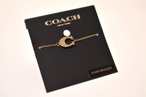 اسوارة يد كوتش C ذهبي