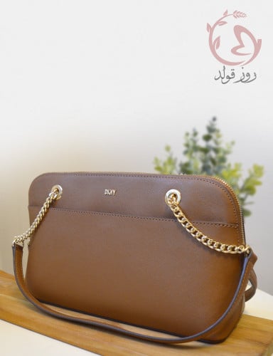 شنطة كتف دكني