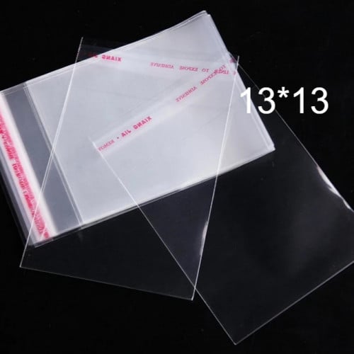 اكياس شفافه لاصقه وطني تزن500 جرام مقاس 13*13