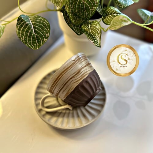 كوب فخار مع صحن