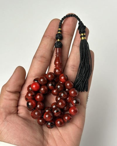 مسباح بكلايت احمر بعرق اسود