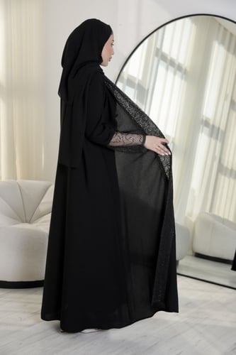 عباية سوداء بالتل