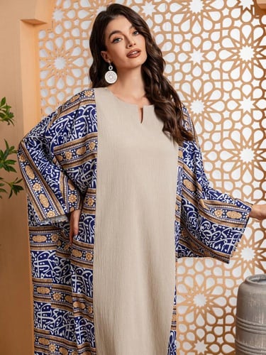 عباءة نسائية بلون أحادي
