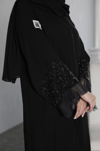 عباية اماراتيه بشك اسود