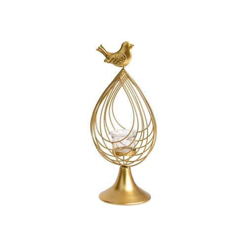 Candle holder in the shape of a cage