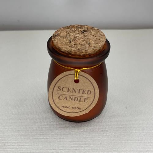 Scented candles in a jar with a cork lid
