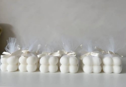 شموع توزيعات مع تاق أنيقة ومميزه