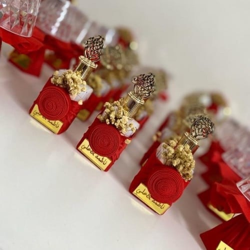 مجموعة (12) عطر مسك مع التنسيق ولوقو حسب الطلب