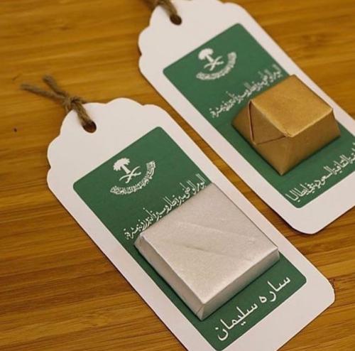 توزيعات اليوم الوطني تاق شكولاته