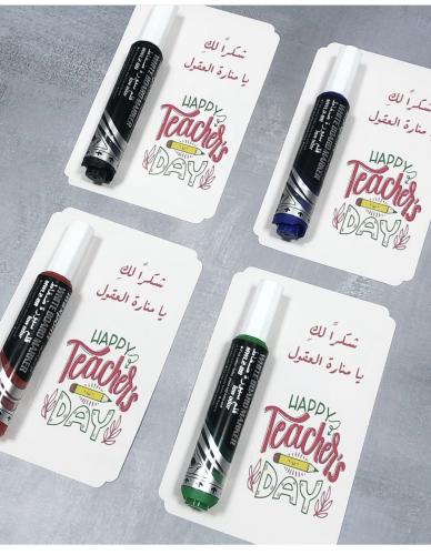 تاق توزيعات يوم المعلم مجهز بأقلام