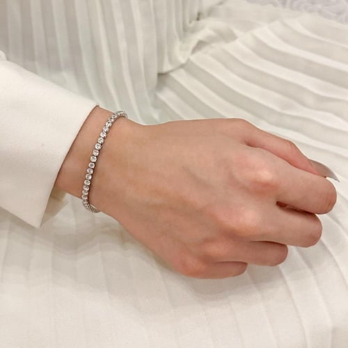 طقم اسورة تنس فضية + اسورة تنس فضية مزينة بفص أخضر...