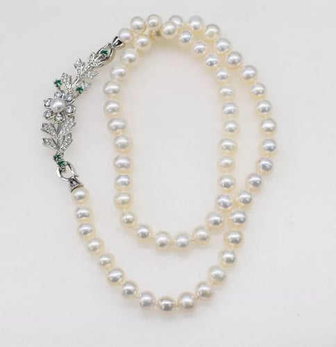 عقد اللولو الطبيعي مع ورقة شجرة الزركون الساحرة