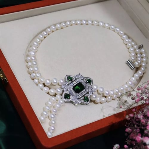 عقد بطبقتين من اللولو الطبيعي مع تعليقة من اجود ان...