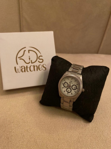 ساعة شبيهة رولكس فضي