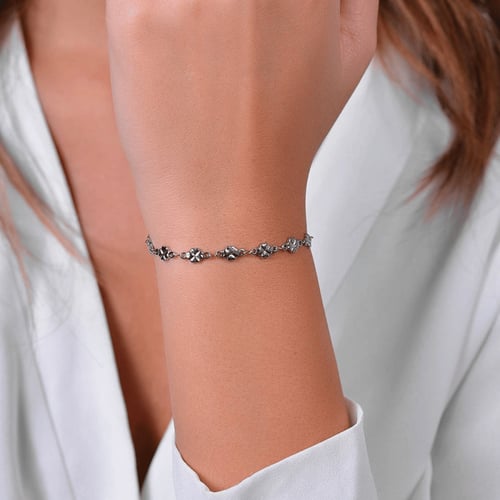 اسوارة ماركة لوكا بارا بتصميم ورود الحظ الأنيقة