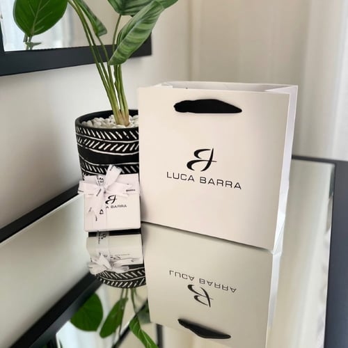 حلق ذهبي بالكرستالات من براند LUCA BARRA