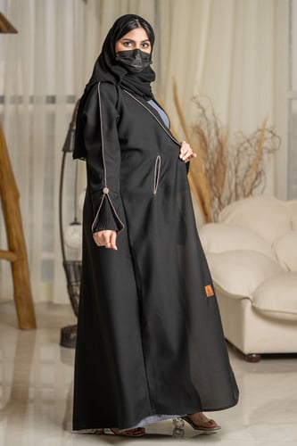 عباية بجيوب مع تدخيلات قيطان وازرة لحمي وكسرات ع ا...